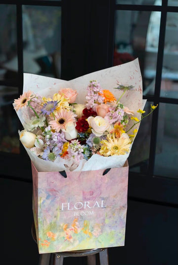 Serene Reverie Woven With Gerbera, Roses And Delicate Cottage Blooms